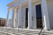 The new Spartanburg County courthouse facade features large white stone columns.
