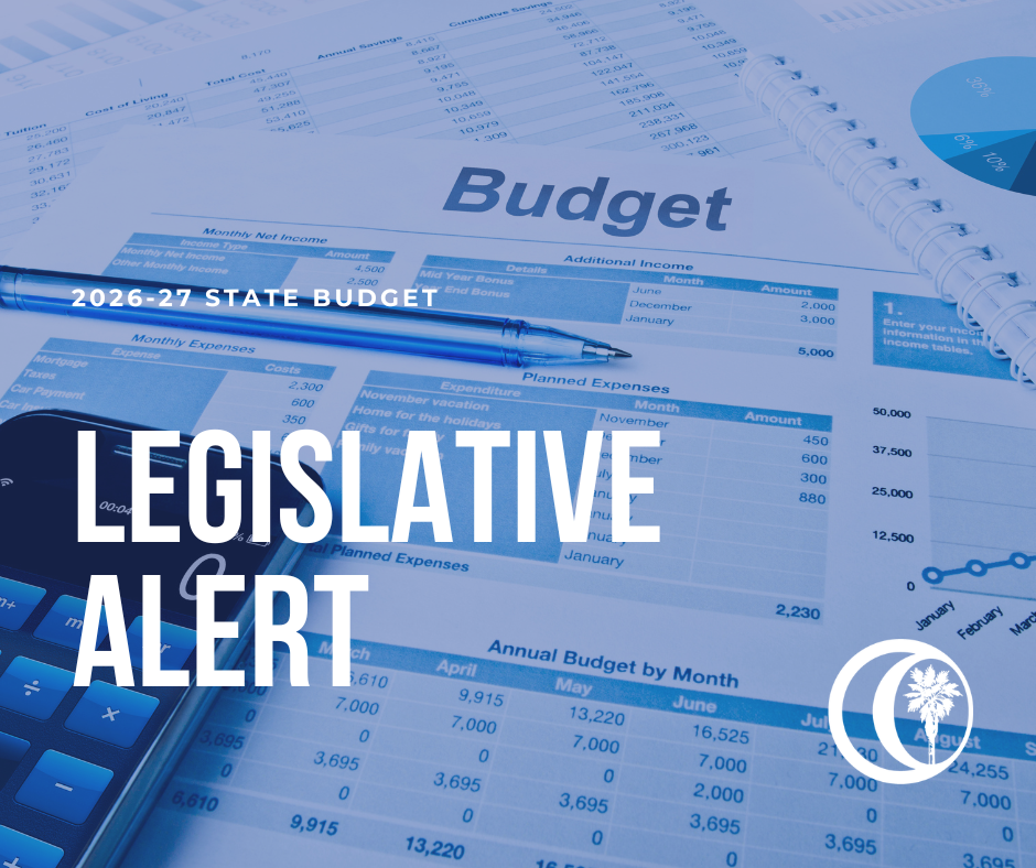 Legislative Alert with budget worksheets in the background