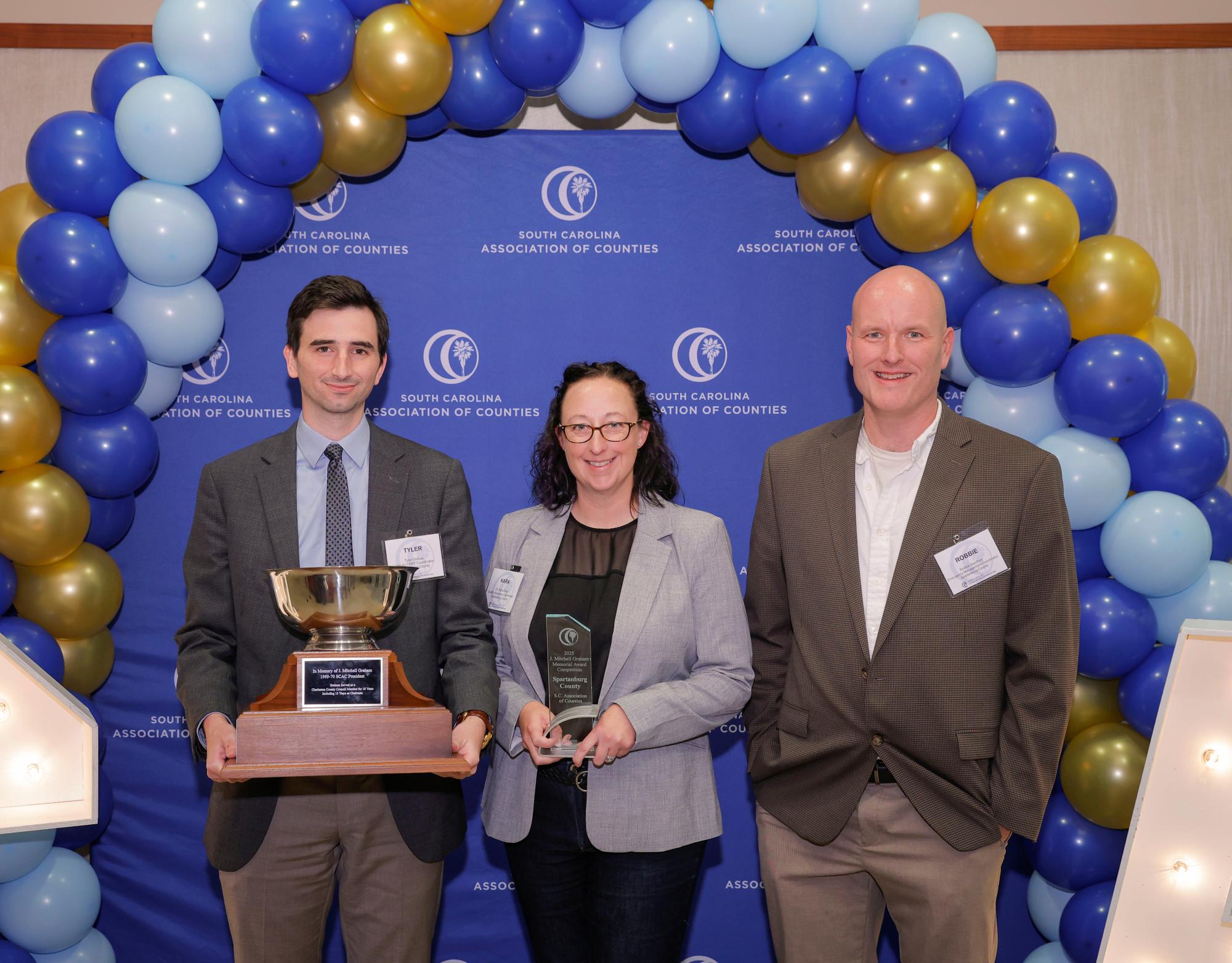 Representatives from Spartanburg County accept the 2025 J. Mitchell Graham Award.