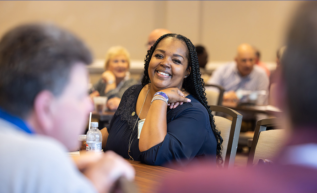 institute of government attendee smiling