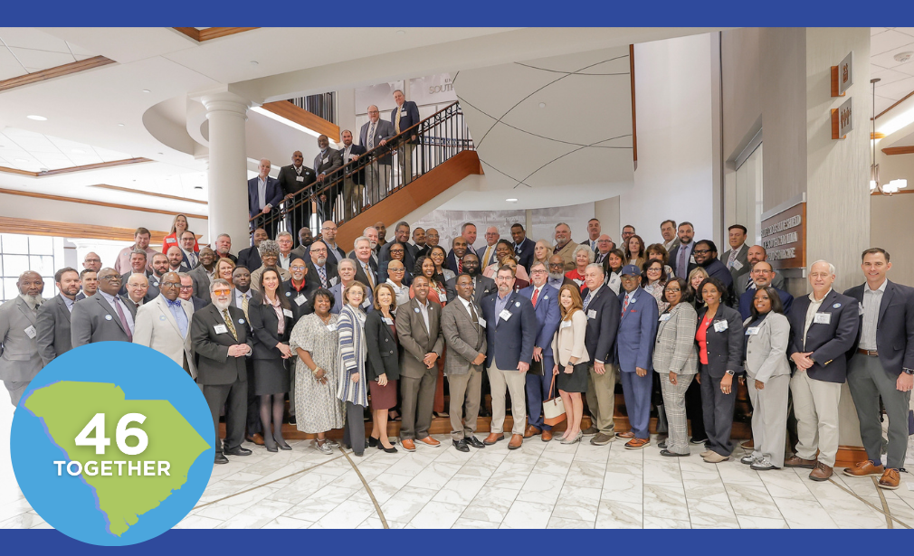 2026 Counties Connect attendees pose for a photo before heading to the State House
