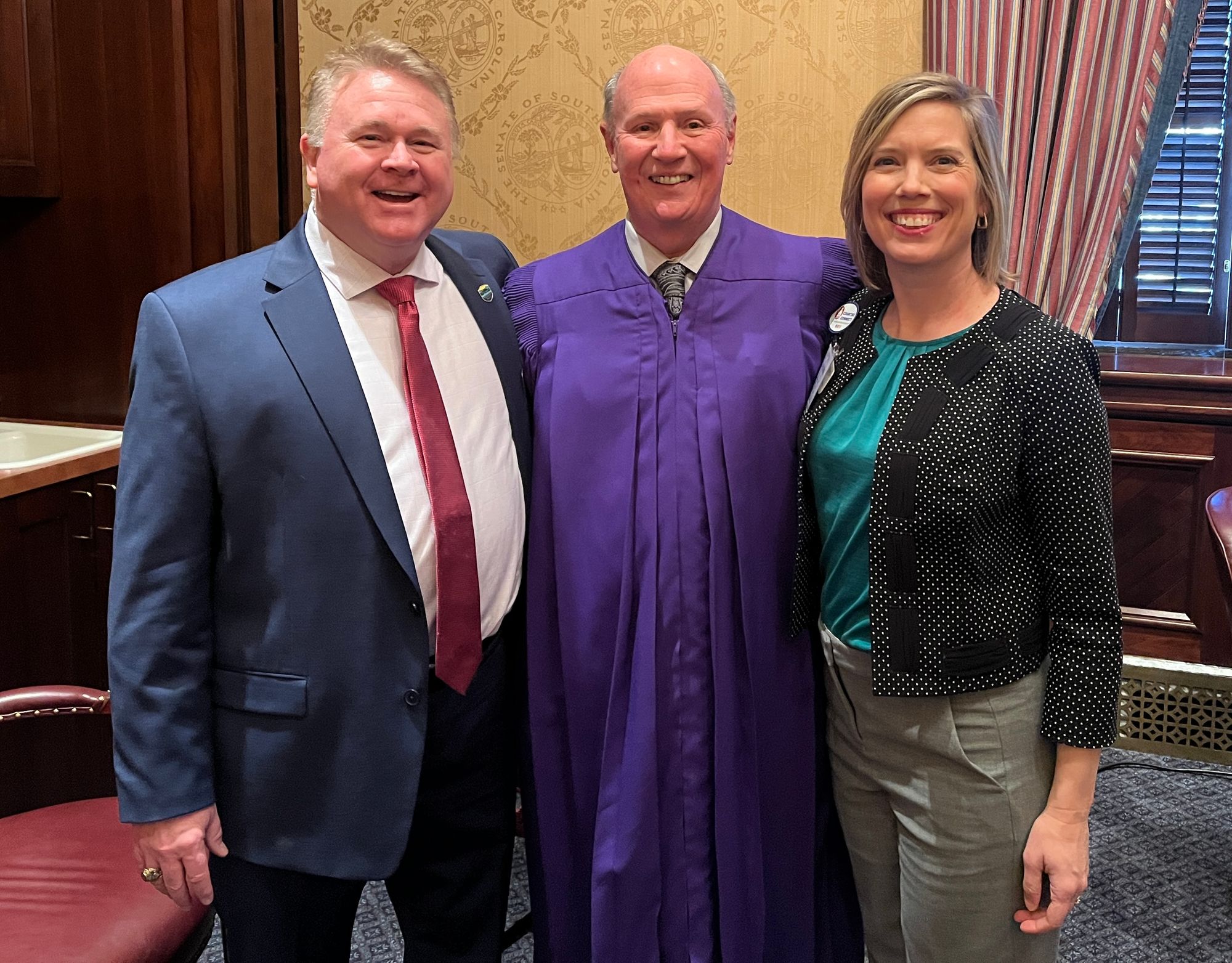 SCAC President Roy Costner III, SC Senate President Thomas Alexander and Pickens County Councilwoman Claiborne Linvill pose for a photo at the South Carolina State House.