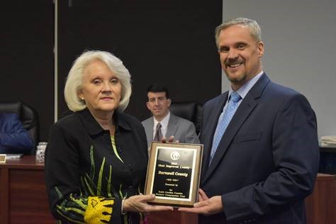 Debbie Fickling accepts Most Improved County award
